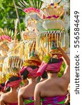 Small photo of Group of beautiful Balinese women in costumes - sarong, with offering for Hindu ceremony. Traditional dances, arts festivals, culture of Bali island and Indonesia people. Indonesian travel background