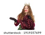 Small photo of Fashion photo of a beautiful elegant young teenager girl with long curly hair in the crown and a pretty long green skirl isolated on white background. Smile with braces