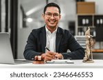 Small photo of Handsome businessman lawyer of Indian descent. trusted litigation lawyers attorneys. most commonly referred to litigator, helping clients civil law services in all aspects of civil litigation cases