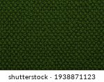 Small photo of Seamless dark green loopback carpet texture shot from above.