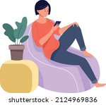 woman on couch using smartphone....