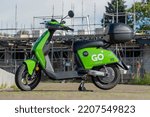 Small photo of Amsterdam, the Netherlands - september 2022: Electric shared scooters from Felyx, Go Sharing and Check can be used in towns and villages. Ensures sustainable mobility but also (parking) nuisance.