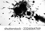 Small photo of Grunge splash. Black ink. Dark fluid drops stain blotch spreading on white abstract background illustration with free space.