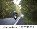 Back View Of Motorcyclist In...