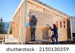 Carpenters Mounting Wooden Osb...