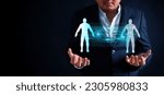 Small photo of Digital twin metaverse technology and IoT platform in 3D human shape and wireframe on businessman hands background. Industrial digital twin artificial intelligence concept.