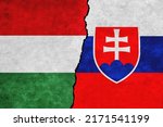 Hungary and Slovakia painted flags on a wall with a crack. Slovakia and Hungary relations. Hungary and Slovakia flags together