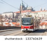 Tram in Prague with Castle in Background