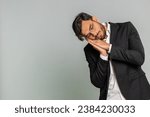 Small photo of Tired exhausted Indian businessman yawning, sleepy inattentive feeling somnolent lazy bored gaping suffering from lack of sleep, falling asleep. Arabian Hindu man isolated on gray studio background
