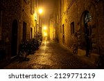 Foggy Night in a Medieval Village in Umbria Italy in Winter