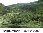 Small photo of Famous Poco da Ribeira do Ferreiro waterfalls in the rainforest near, Faja Grande, Flores, Azores, Portugal