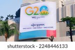 Small photo of Jakarta, Indonesia - December 15, 2022: Logo of the 2023 G20 conference in India seen on billboard, India G20 summit 2023 logo with the slogan One earth, one family, one future. India G20