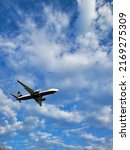 Small photo of BARCELONA, SPAIN - 6th of May 2022: Ryanair airplane landing in Barcelona - El Prat Airport in a cloudy day. Ryanair is a low cost Irish airline.