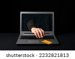 Small photo of A cybercriminal reaching through a laptop to steal an online shopper's credit card. Internet scams