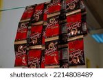 Small photo of Indonesia, Makassar - September 30, 2022: coffee sachets with the ship firebrand hanging on a rope