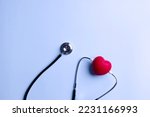 Stethoscope to listen to red heart rate to diagnosis disease. Healthcare concept.