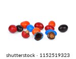 colorful of chocolate candies stuffed with nuts isolated on white background