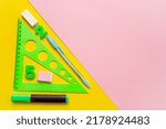 Small photo of school supplies, trackball, felt-tip pen, pen, eraser, on a colorful background with copy space, back to school concept