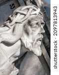 Small photo of old sculpture in a cemetery in Havana, Cuba, Madonna, Crist, angel, hand