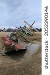 Small photo of Merauke, Papua, Indonesia - 10 02 2021: Close-up of a fishing boat that sank on the coast of Merauke