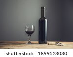 Wine Bottle And Glass With...