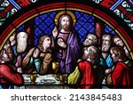 Small photo of Basel Cathedral Minster. Stained glass window. The Last Supper is the final meal that Jesus shared with his Apostles. Switzerland. 12-30-2017