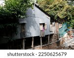 Small photo of Poor housing. Temporary home that downgrade from metal sheet. Vietnam.