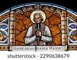 Small photo of Thi Nghe Church. Stained glass. Saint John Vianney, was a French Catholic priest who is venerated in the Catholic Church as the patron saint of parish priests. Ho Chi Minh City. Vietnam. 12-10-2022