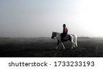 Bromo Horse Rider In Foggy...