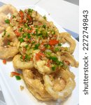 Small photo of Fried calamary is incredibly easy to make at home, so much better then the restaurants ! The recipe has a crispy better fries perfectly to a golden brown crunch !