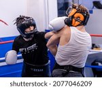 Small photo of HELSINKI, FINLAND – NOVEMBER 11 2021: Professional boxers Jamil Elo (white shirt) and Jose Antonio Sanchez Romero sparring at Ringside Gym