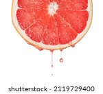 Small photo of Red grapefruit essential oil dripping. Fresh citrus slice dripping with juice or oil serum ingredient. Seed oil extract.
