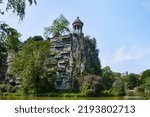 Small photo of Paris, France - May, 2022: Temple de la Sibylle in the Parc des Buttes Chaumont in Paris France on a beautiful Spring day