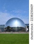 Small photo of Paris, France - May, 2022: La Geode in the Parc de la Villette. Its a mirror-finished geodesic dome with an Omnimax theatre at the Cite des Sciences et de l Industrie