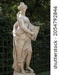 Small photo of Marble statue of Mercy (Clementia) by Pietro Baratta in Summer Garden, Saint Petersburg, Russia