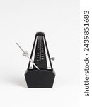 Black metronome isolated on...