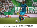 Small photo of Lisbon, Portugal - 09 13 2022: UEFA Champions League game between Sporting CP and Tottenham Hotspur F.C; Eric Dier with the ball during game
