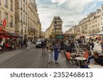 Small photo of paris france 08 08 2023 : city life in Saint Paul , Le Marais , vibrant cultural and popular area of Paris