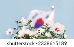 Blue sky Republic of Korea Taegeukgi and Mugunghwa flower and Samiljeol and Liberation Day, Constitution Day and Hangeul Day and Memorial Day Korean national holidays background

