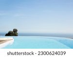 Luxury infinity pool overlooking hillside