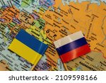 The ukrainian and russian flags ...