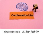 Small photo of Confirmation bias.The word is written on a slip of colored paper. Psychological terms, psychologic words, Spiritual terminology. psychiatric research. Mental Health Buzzwords.