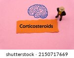 Small photo of Corticosteroids.The word is written on a slip of colored paper. Psychological terms, psychologic words, Spiritual terminology. psychiatric research. Mental Health Buzzwords.