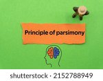 Small photo of Principle of parsimony.The word is written on a slip of colored paper. Psychological terms, psychologic words, Spiritual terminology. psychiatric research. Mental Health Buzzwords.