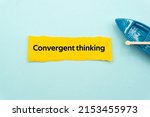 Convergent thinking.The word is written on a slip of colored paper. Psychological terms, psychologic words, Spiritual terminology. psychiatric research. Mental Health Buzzwords.
