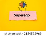 Small photo of Superego.The word is written on a slip of colored paper. Psychological terms, psychologic words, Spiritual terminology. psychiatric research. Mental Health Buzzwords.