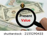Present Value.magnifying Glass...