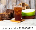 winter melon tea served in disposable cup isolated on table side view taiwan style