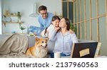 Small photo of A Parent Working From Home. Mom Experiences the Stress of Working Remotely At Home, Daughter and Father Play and Interfere with Mom's Work. Family on Self-Isolation. Family Financial Crisis