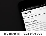 Small photo of Closeup of the history of nature journal on a smartphone. Nature is a peer-reviewed academic journal: Dhaka, Bangladesh- Jan 20, 2023